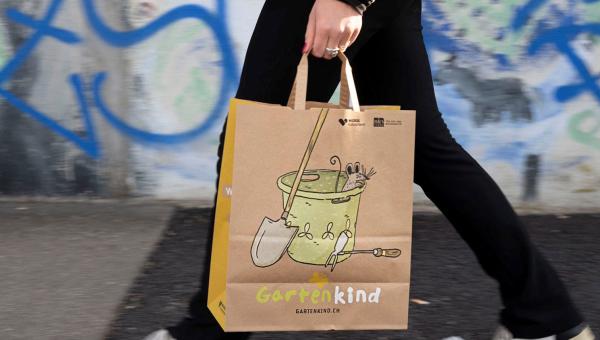 Gartenkind Migros-Tragtasche Eimer Design und Bild Benedikt Dittli
